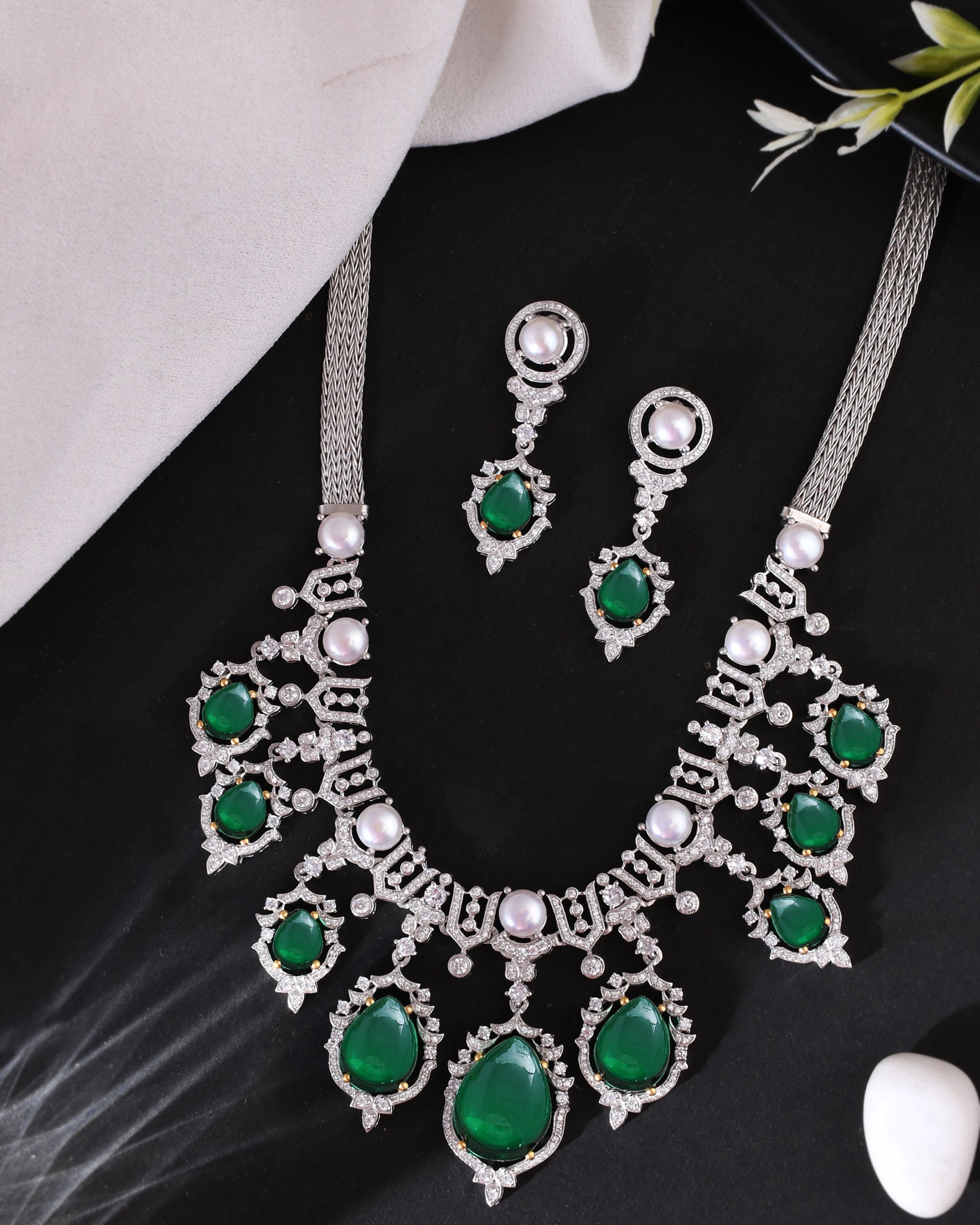 Designer Pearls and Emerald Green Gemstone Studded Silver Necklace Set
