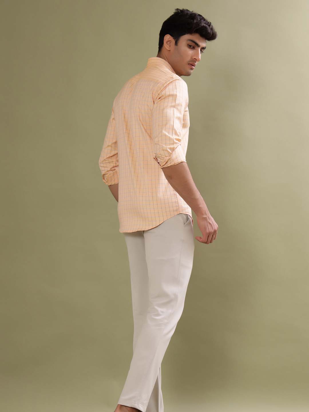 peach color shirt