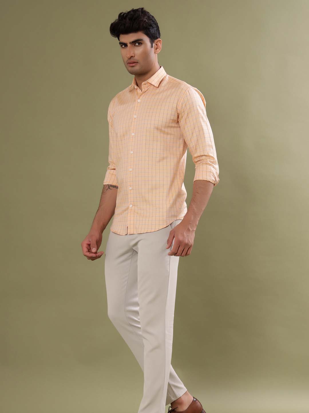 peach color shirt