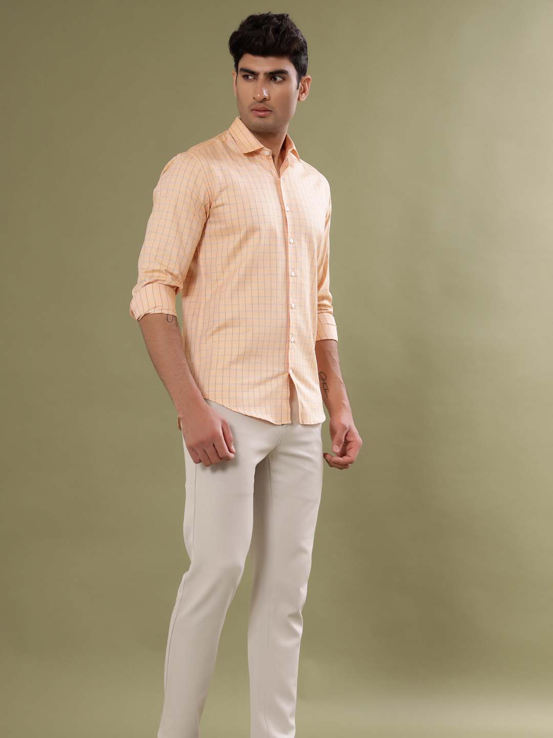 peach color shirt